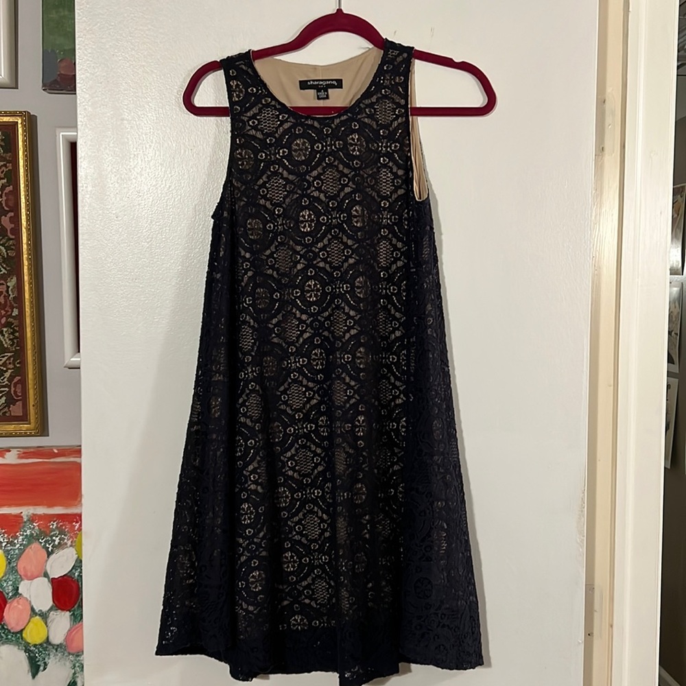 Sharagano sleeveless lace swing dress.